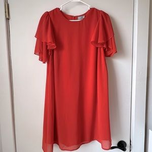 Red orange cocktail dress with ruffled sleeves